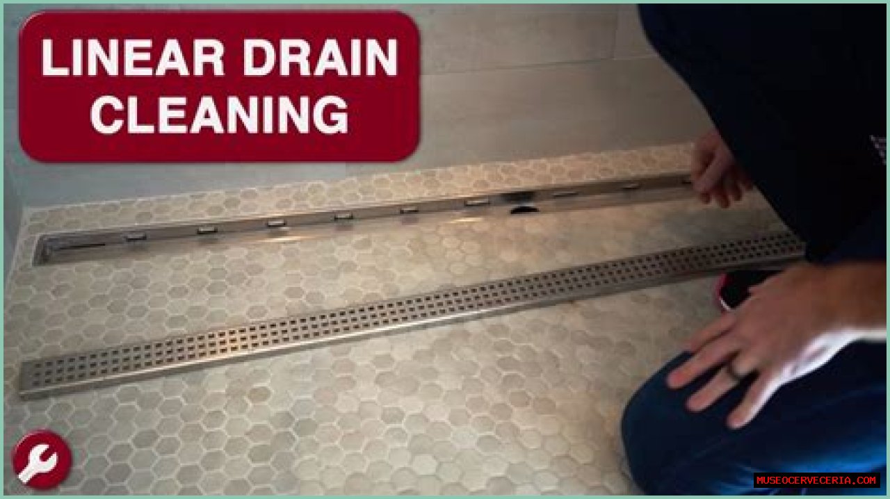 How do you clean a linear drain?